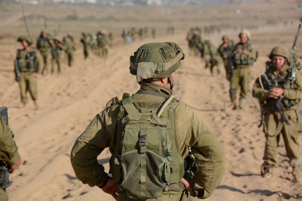 Delusion of Israel’s Security Myth Versus Geopolitical Realties (Part One) - MPC Journal - An officer preparing to turn and lead his troops in Gaza (photo credit: IDF Spokesperson's Unit/ Flickr)