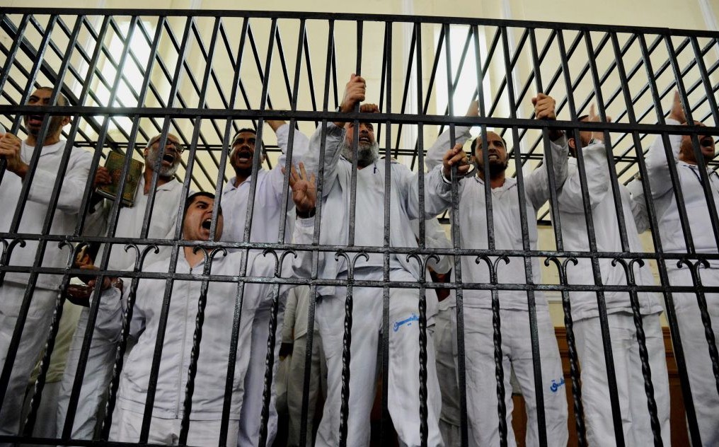 Egypt Sentences Six to Death and Morsi to Life Prison in Qatar Spying Case, Egypt Sentences Six to Death and Morsi to Life Prison in Qatar Spying Case, Middle East Politics &amp; Culture Journal