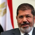 Former Egyptian president Mohamed Morsi, shown in 2012, died Monday during a trial session in an espionage case in Cairo – © Image: Khaled Elfiqi/EPA-EFE/Shutterstock
